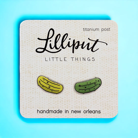 Lilliput Little Things Handmade Pickle Earrings on blue background Front View