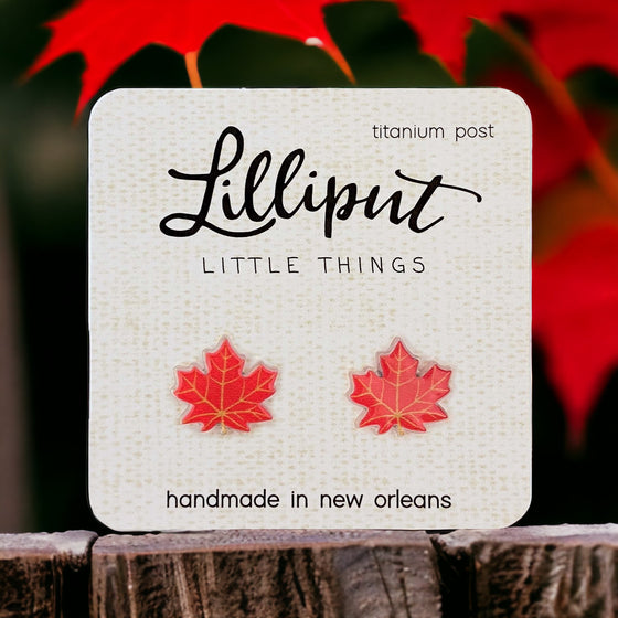 Lilliput Little Things Handmade Maple Leaf Earrings with fall background - Front View