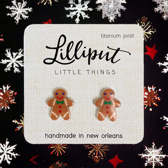Lilliput Little Things Handmade Christmas Gingerbread Man Earrings with snowflake background - Front View